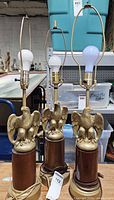 Front view showing all three eagle lamps with harps and bulbs