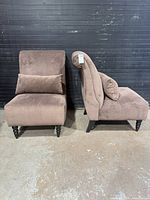 Front and side view of both slipper chairs showing upholstery, legs, and pillows