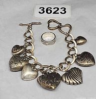 Bracelet and ring together showing scale and design details