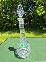 Full view of crystal decanter with stopper in place