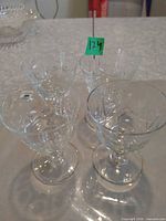 All four crystal wine glasses overhead view