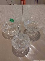 Group shot of three cut glass dishes