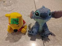 Stitch and Winnie the Pooh plush front view