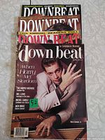 Stack of four Down Beat magazines, Harry Connick Jr. cover visible