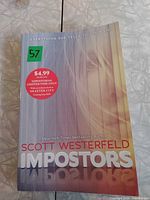 Front cover showing title, author, price sticker