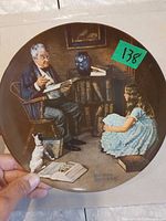 Front of The Storyteller plate showing artwork