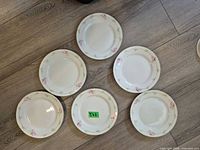 Six Noritake plates front view showing pattern and quantity
