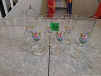 Front view of seven Schwabenbräu beer glasses on tabletop
