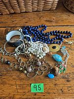 Entire assortment laid out showing all nine jewelry pieces