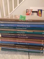 Stack of 15 Time-Life Fitness, Health & Nutrition books showing titles and coloured spines