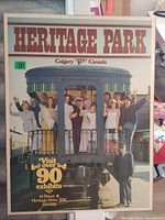 Front view of printed Heritage Park advertisement on board