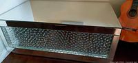 Full view of mirrored console table top and front
