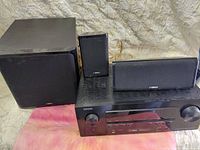 Denon receiver, Yamaha bookshelf speaker, Yamaha center speaker and Yamaha subwoofer