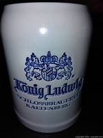 Front view showing blue König Ludwig crest and text