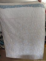 Full view of quilt front held up