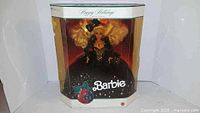 Front view of boxed 1991 Happy Holidays Barbie showing doll and cracked plastic window