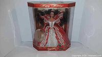 Front view of sealed 1997 Happy Holidays Barbie in box