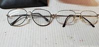 Both pairs of glasses side by side