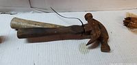 Both claw hammers side by side showing heads and handles
