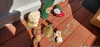 Group shot showing all six Christmas decorations on deck