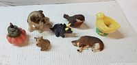 All seven figurines grouped together