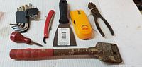 Overall view of seven hand tools laid out