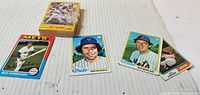 Front view: stack of Score yellow cards and four loose Mets cards