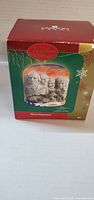 Front of boxed Carlton Cards Heirloom Mount Rushmore ornament