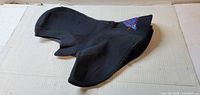 Overall view of black neoprene diving hood