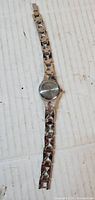 Full view of Delin silver-tone wristwatch with link bracelet