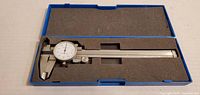 Dial caliper in blue case, full view