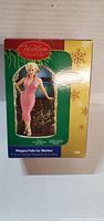 Front of boxed Heirloom Niagara Falls for Marilyn ornament