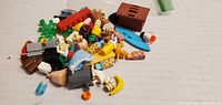 Overview of entire pile of LEGO Friends parts and accessories