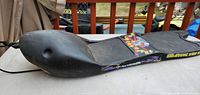 Side and top view of shark sno board showing overall design and deck graphics