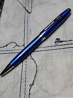 Full view of blue chrome Cross Coventry ballpoint pen
