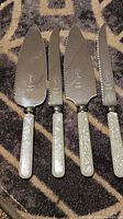 Four pieces laid out showing full blades and handles
