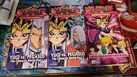 Front covers of all three Yu-Gi-Oh! VHS tapes showing artwork and titles