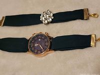 Watch and bracelet side by side showing overall design and matching fabric straps