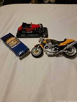Group shot of all three diecast vehicles