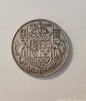Reverse showing Royal Coat of Arms design