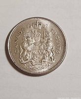 Reverse side showing Canadian Coat of Arms and 1962 date