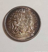 Reverse side showing date, denomination, and crest