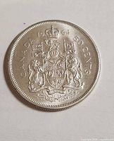 Reverse showing Canadian Coat of Arms and date