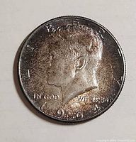 Obverse of 1964 Kennedy Half Dollar showing JFK portrait and date