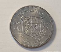 Obverse displaying coat of arms and dates 1874-1974