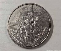 Reverse view showing Jacques Cartier design, legends, and condition