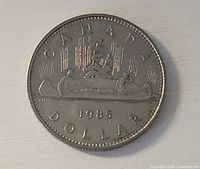 Reverse showing canoe design and 1985 date