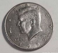 Obverse of 1999-D Kennedy half dollar showing date and mint mark