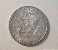 Reverse side showing presidential seal
