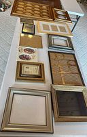 Tabletop overview of all frames, showing variety in size, color and material